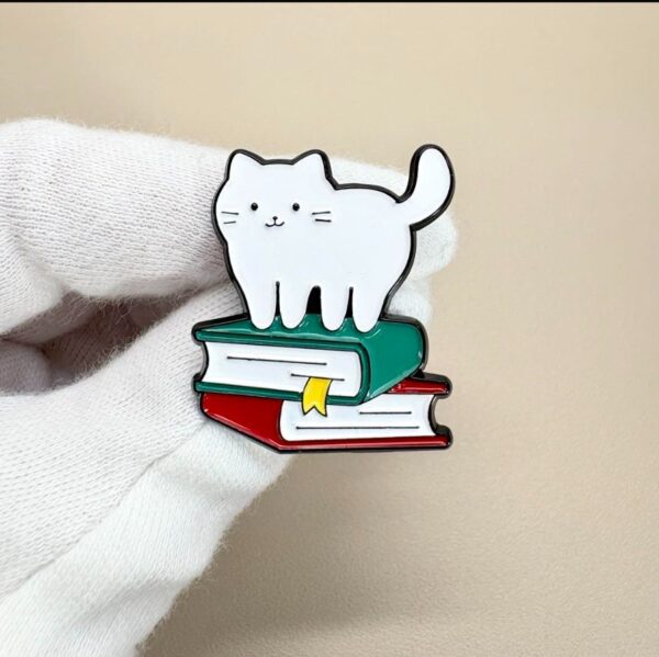 White Cat on Books Enamel Pin